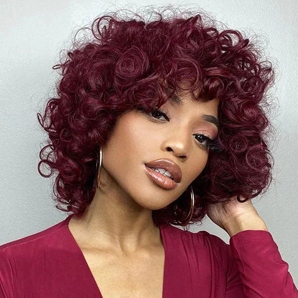 Colored wig with a wispy fringe for a soft and feminine lookJunoda Burgundy Red 99j Bouncy Loose Curly Short Bob Wigs Full Machine Made Human Hair Wig with Bangs