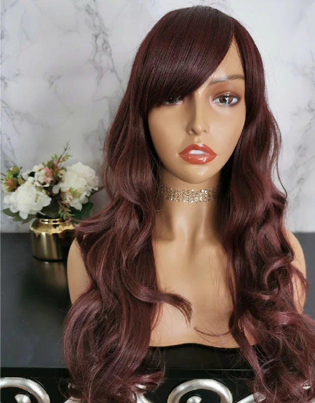 Long - length wig with a wispy fringe for a soft and feminine look185K