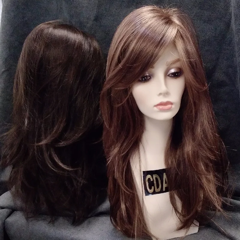 Long - length wig with a curly fringe for a playful and youthful vibeALEX PM